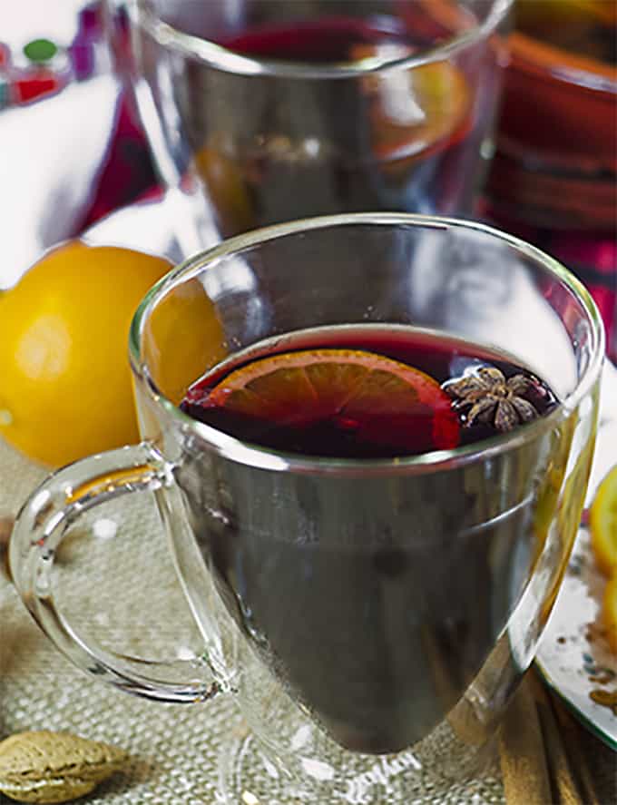 A glass of mulled sangria with fruit