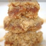 Stack of oatmeal bars filled with apple butter.