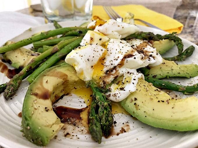 A plate of food, with Avocado and Egg
