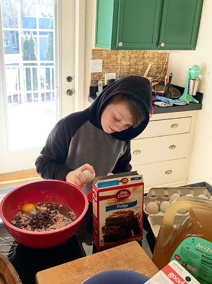 Boy making a chocolate cake