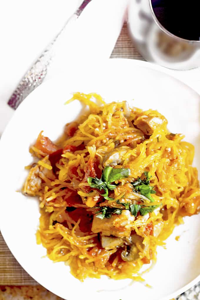 A plate of food with spaghetti squash