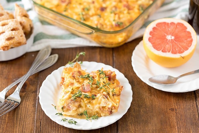 A plate of food with a grapefruit