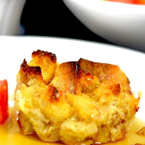 Serving of French toast casserole with bacon.