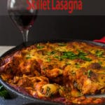 skilledt lasagna with glass of red wine.