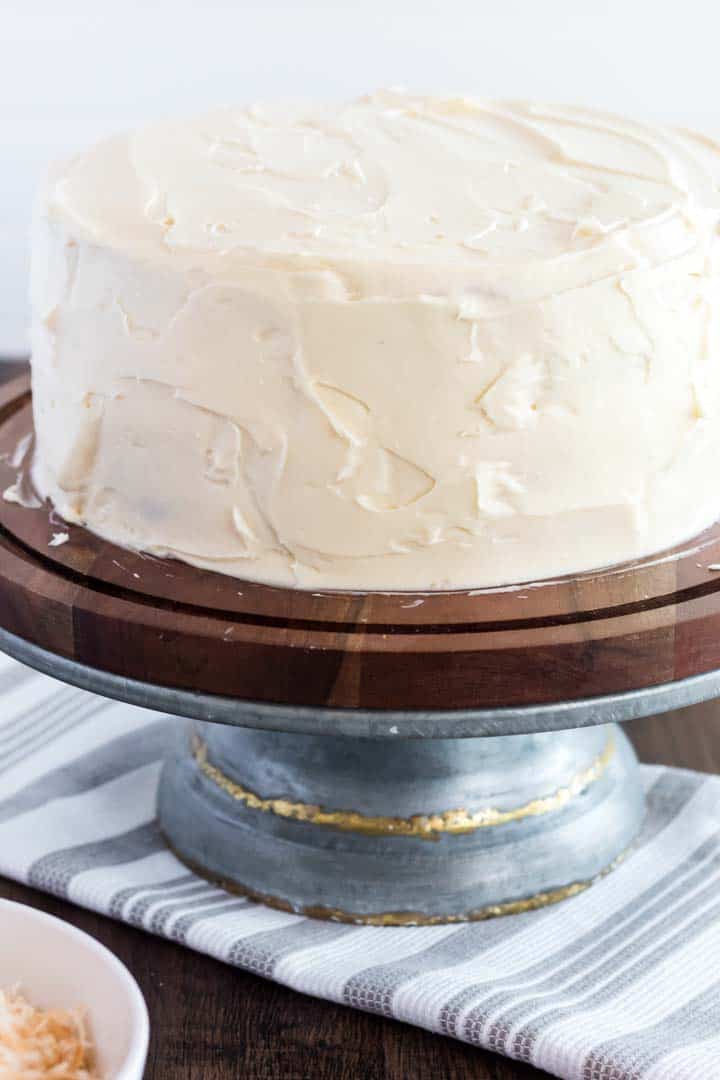 Homemade cocount carrot cake with cream cheese frosting.