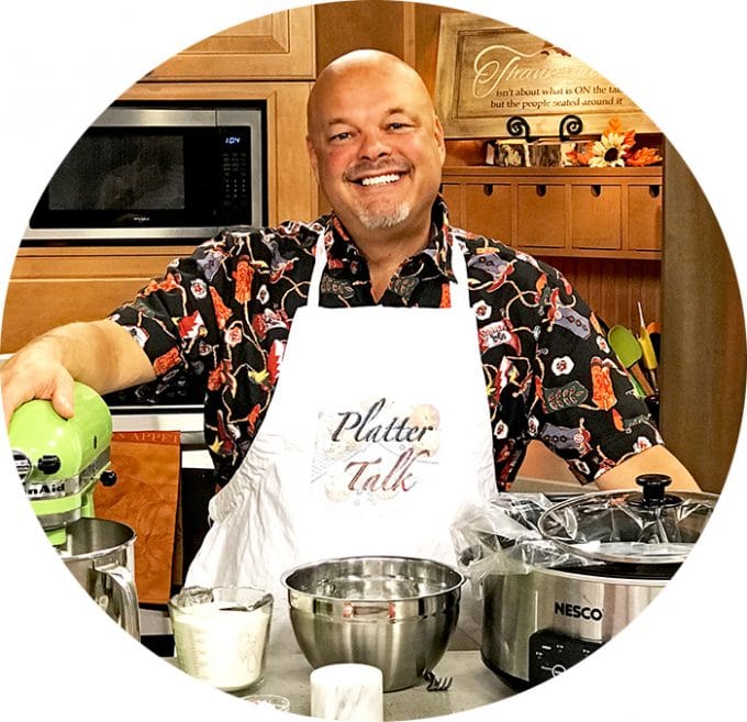 Man with an apron in a kitchen