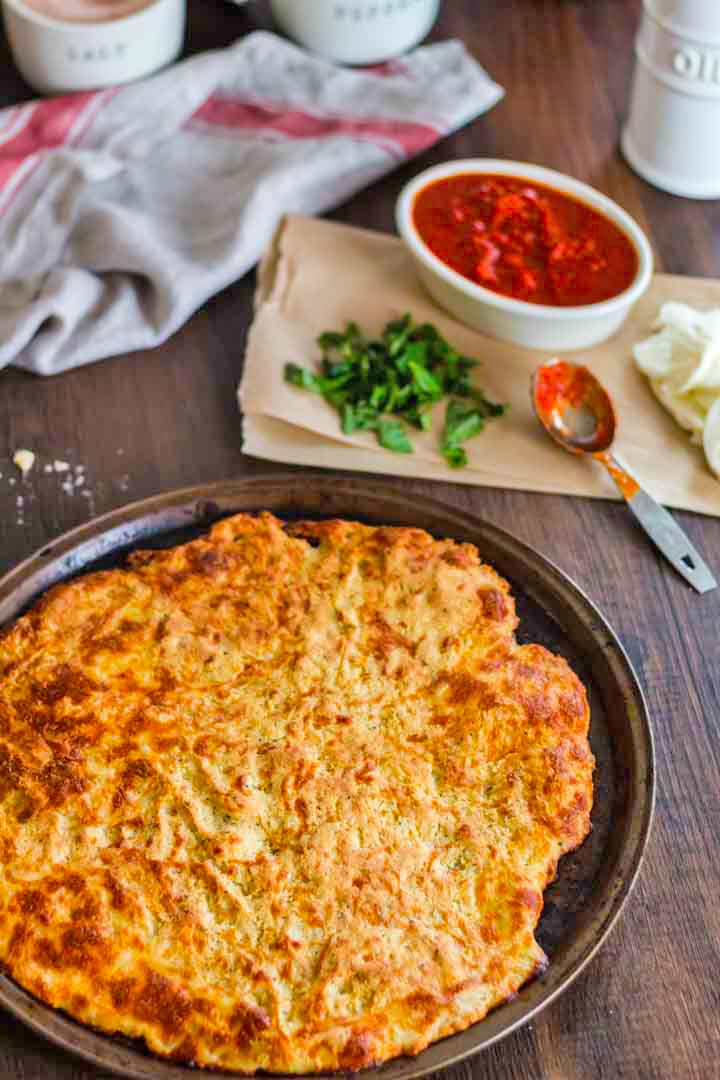 A keto pizza crust on top of a table