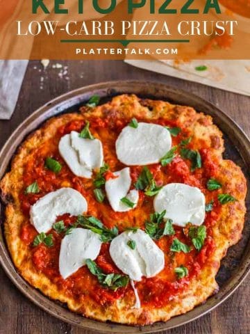 A pizza sitting on top of a table