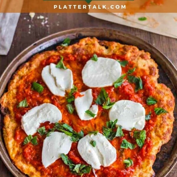 A pizza sitting on top of a table