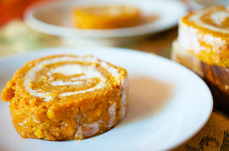 A close up of a piece of cake on a plate, with Pumpkin and Platter