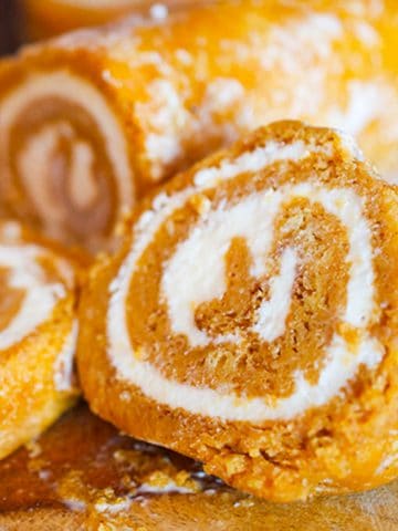 A pumpkin cake roll cut in half