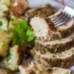 Fork of turkey from a platter.