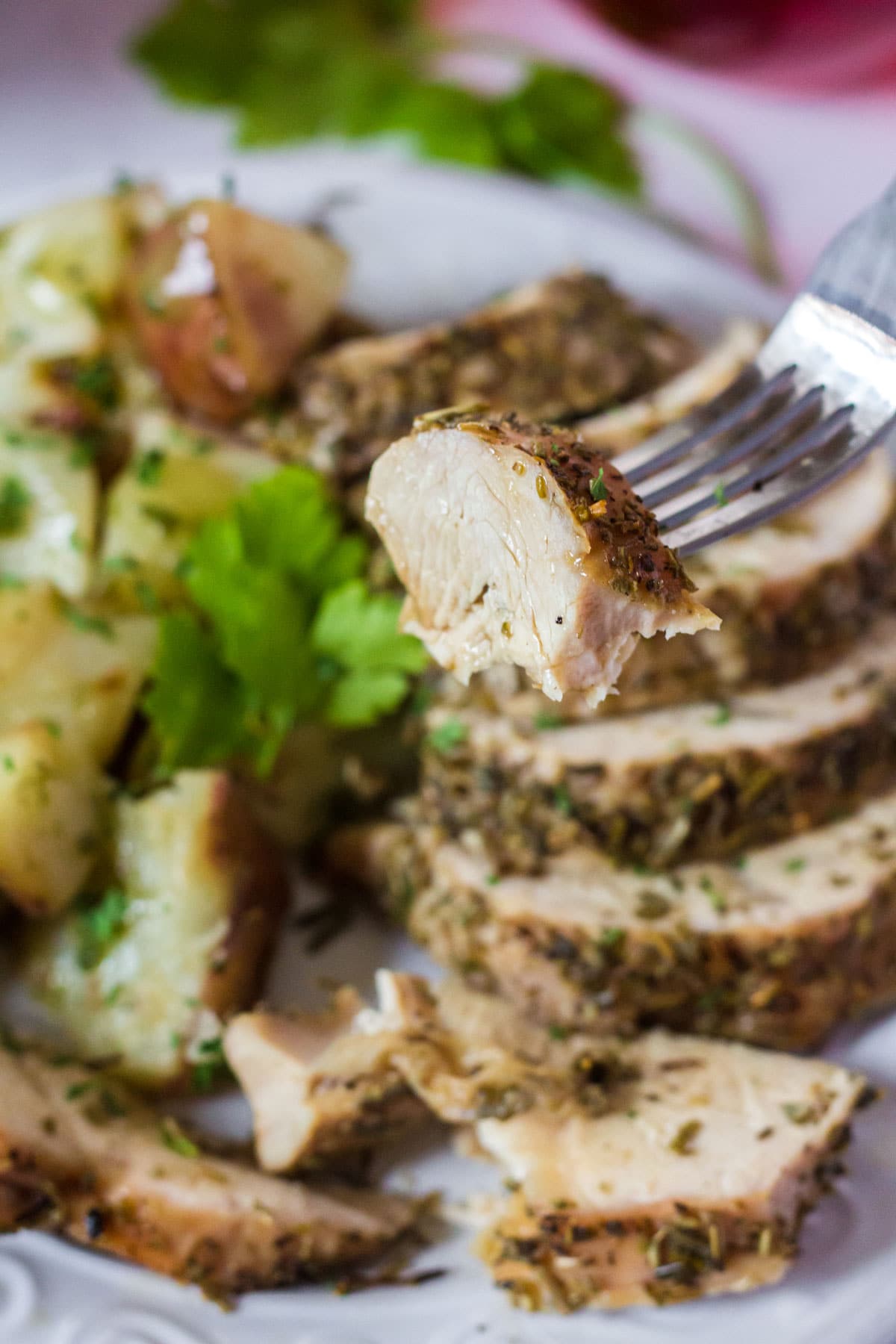 Fork of turkey from a platter.