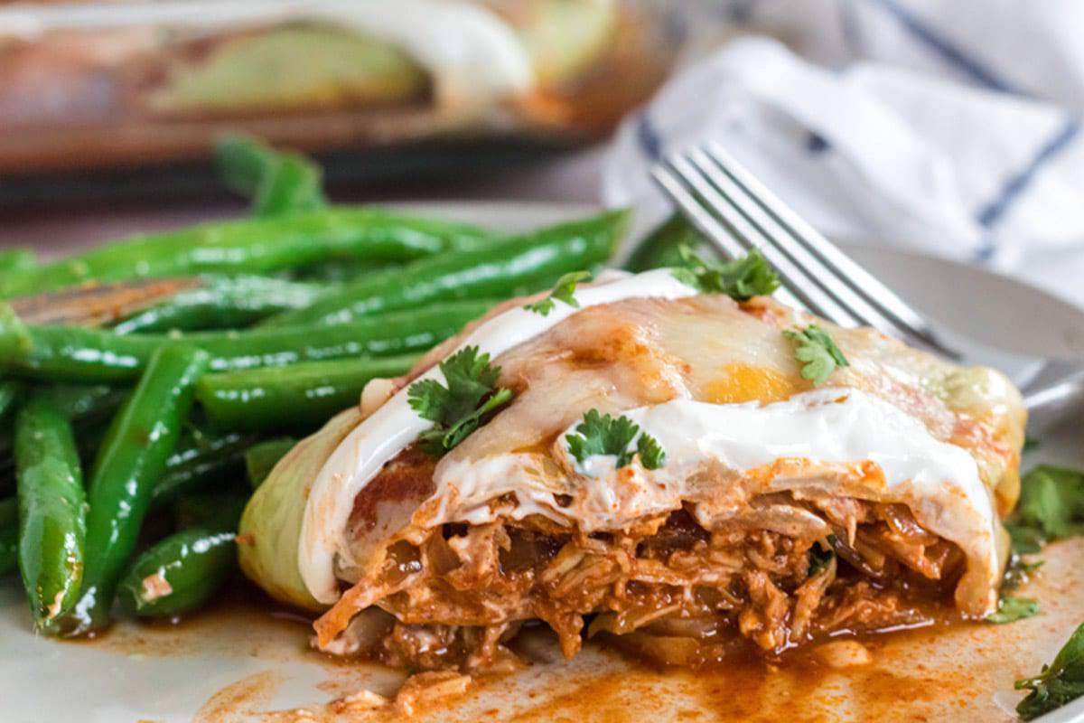 Cross section of a low carb enchilada with green beans.