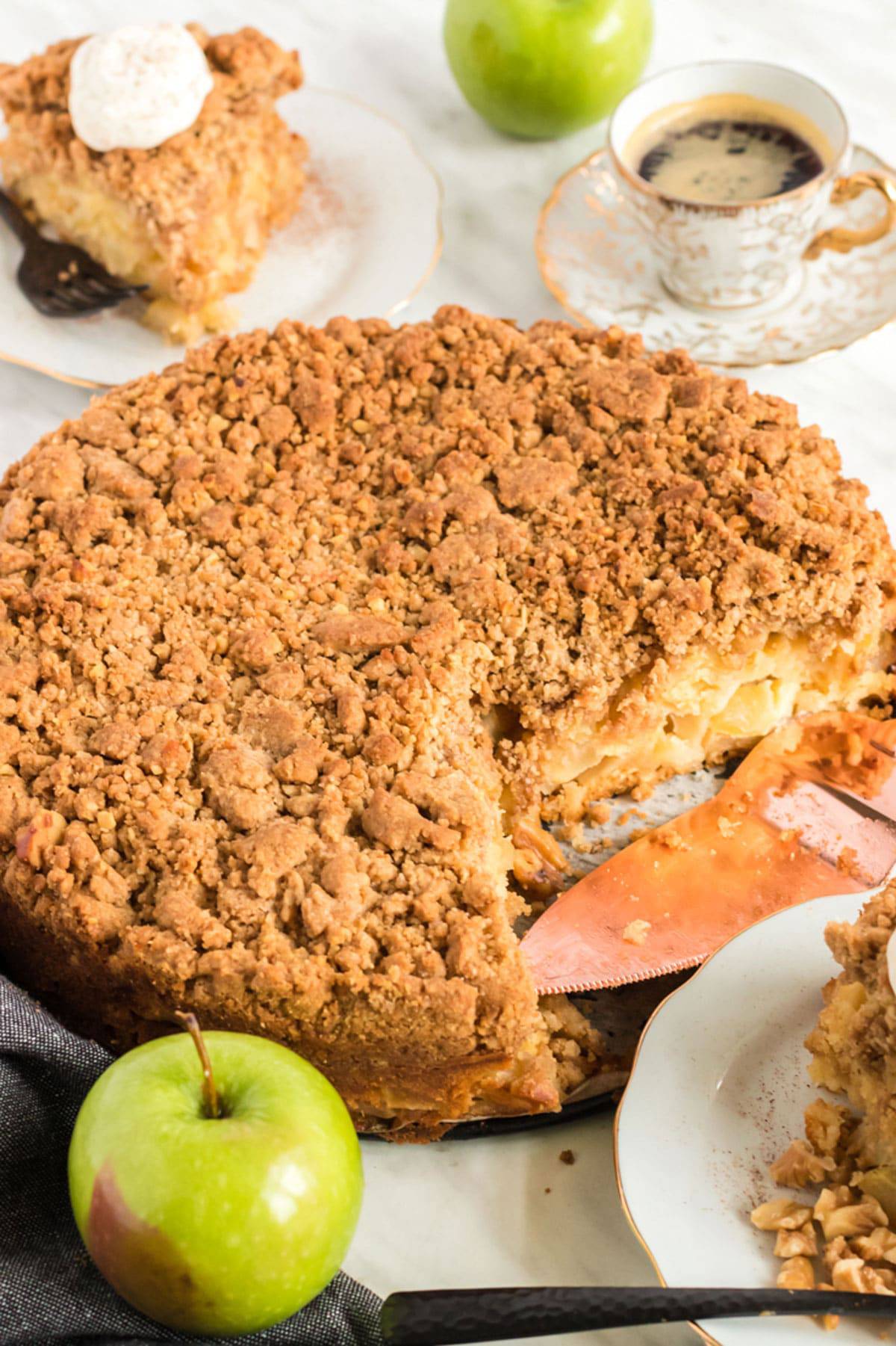 An apple buckle cake on a plate