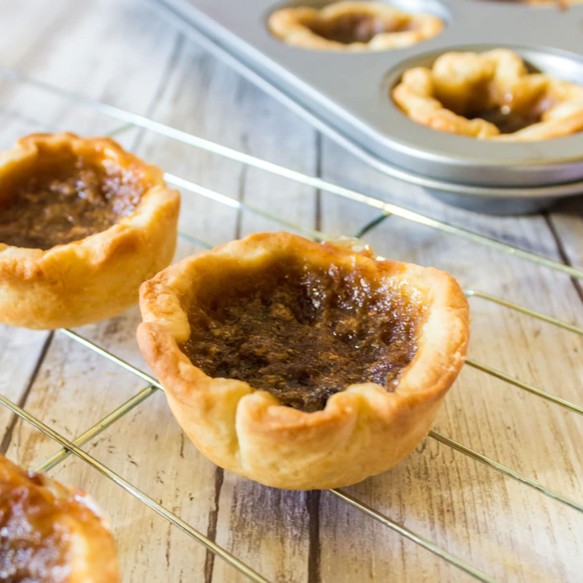 Canadian butter tart on a cooling rack