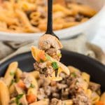 Skillet of pasta and ground beef.