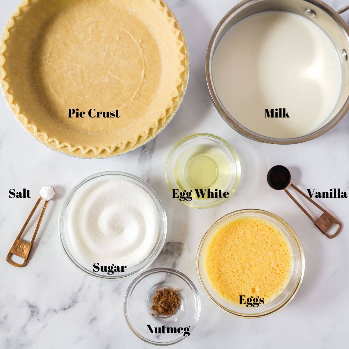 Milk and other ingredients for making a egg custard pie