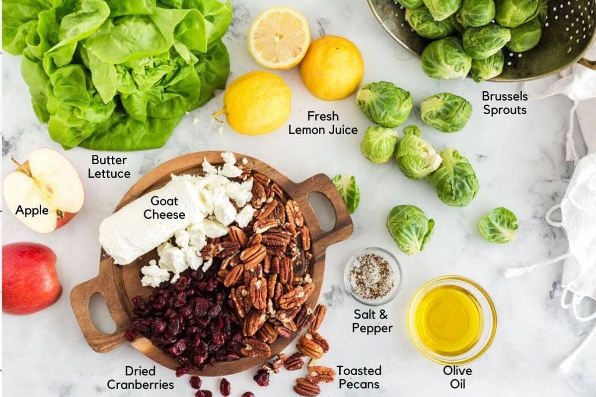 Lemons, Brussels sprouts, and other ingredients for a salad.