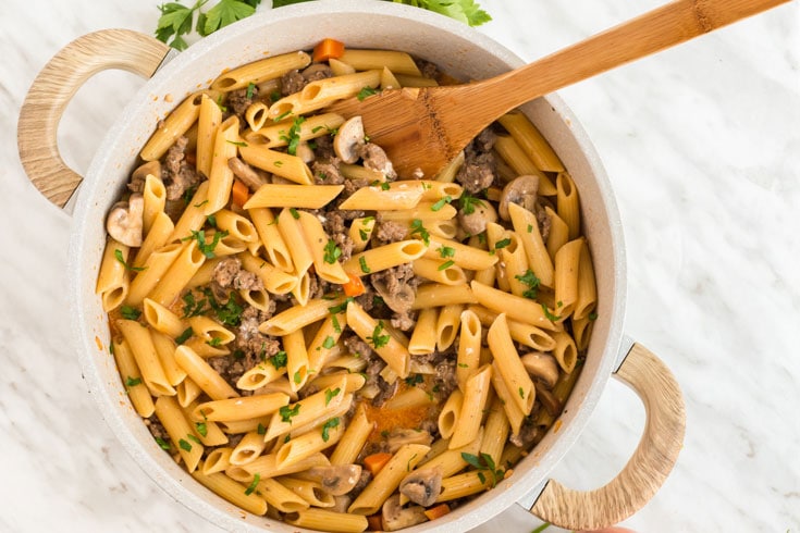 A bowl of food, with Hamburger and Pasta