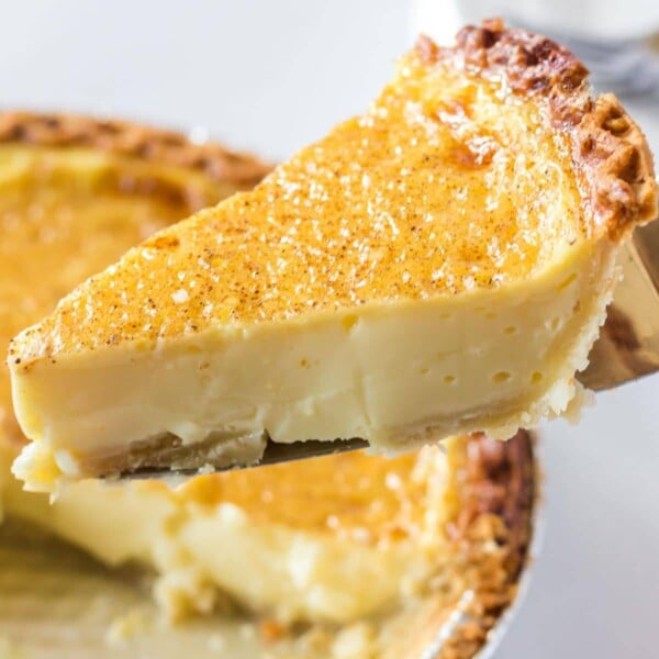 A slice of egg custard pie on a spatula