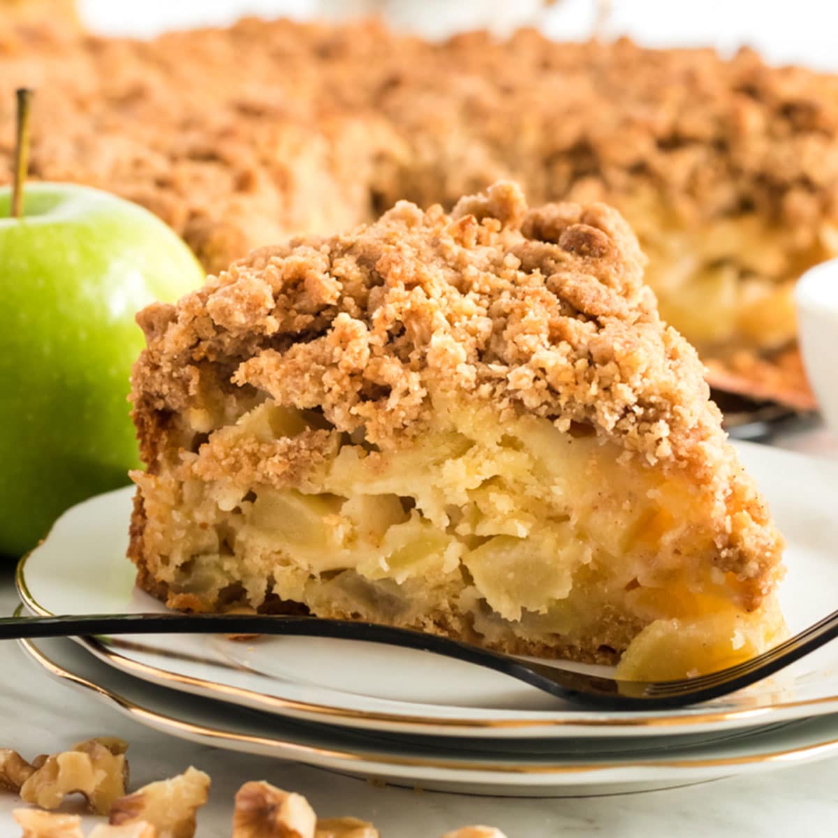 A slice of apple buckle on a plate