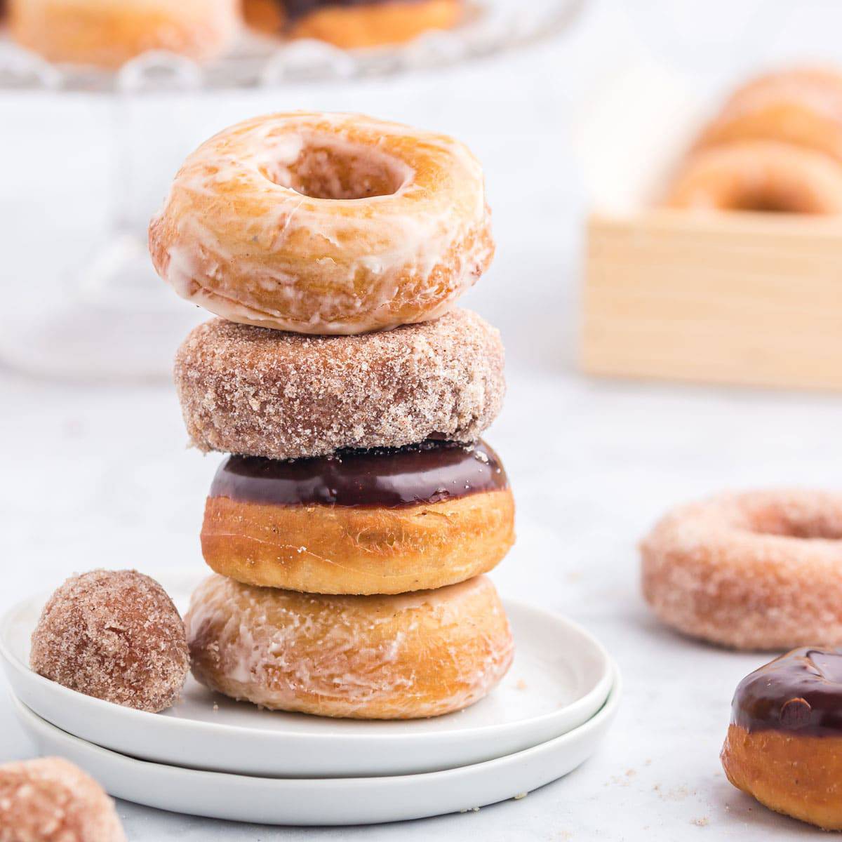 A stack of donuts on a plate