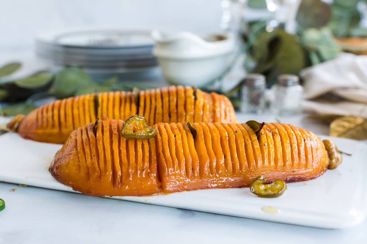 Hasselback squash recipe Butternut squash on a holiday serving plate