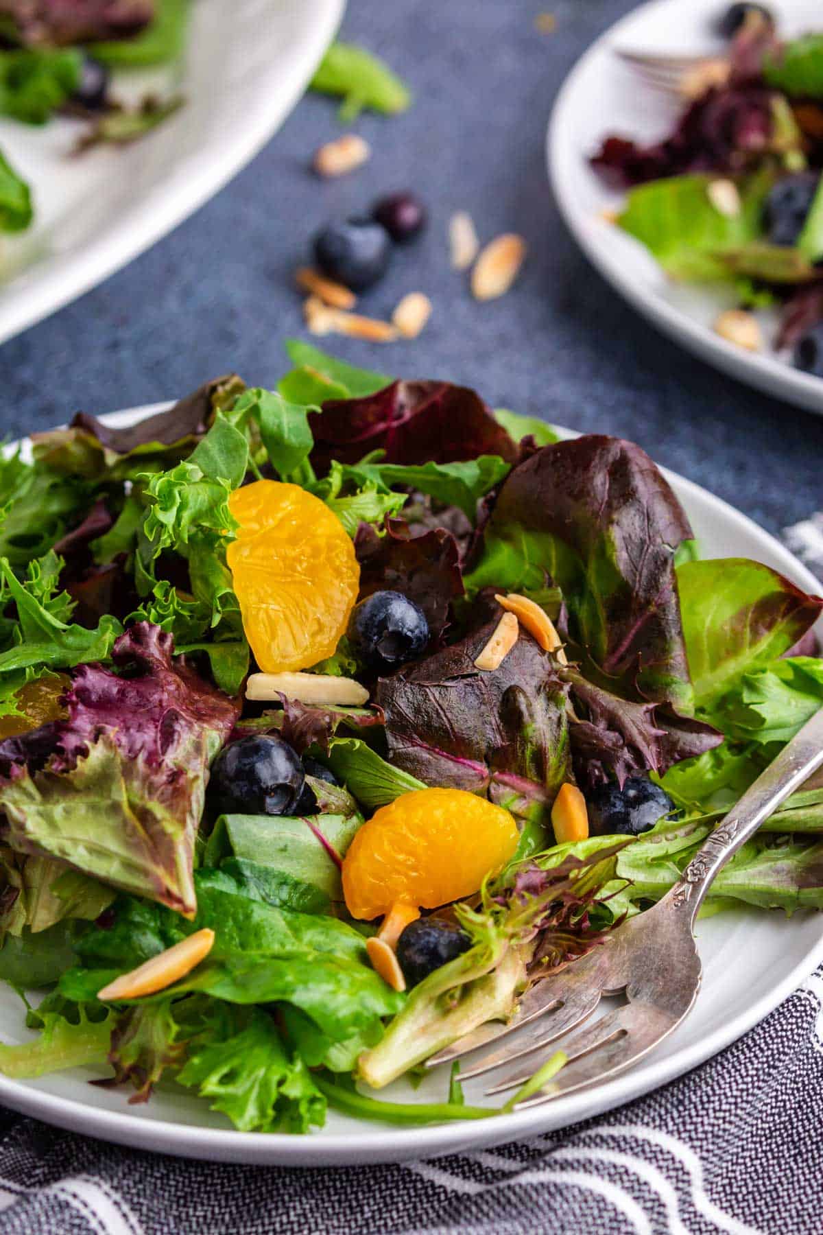 Mandarin orange salad on a plate. Salad on a plate