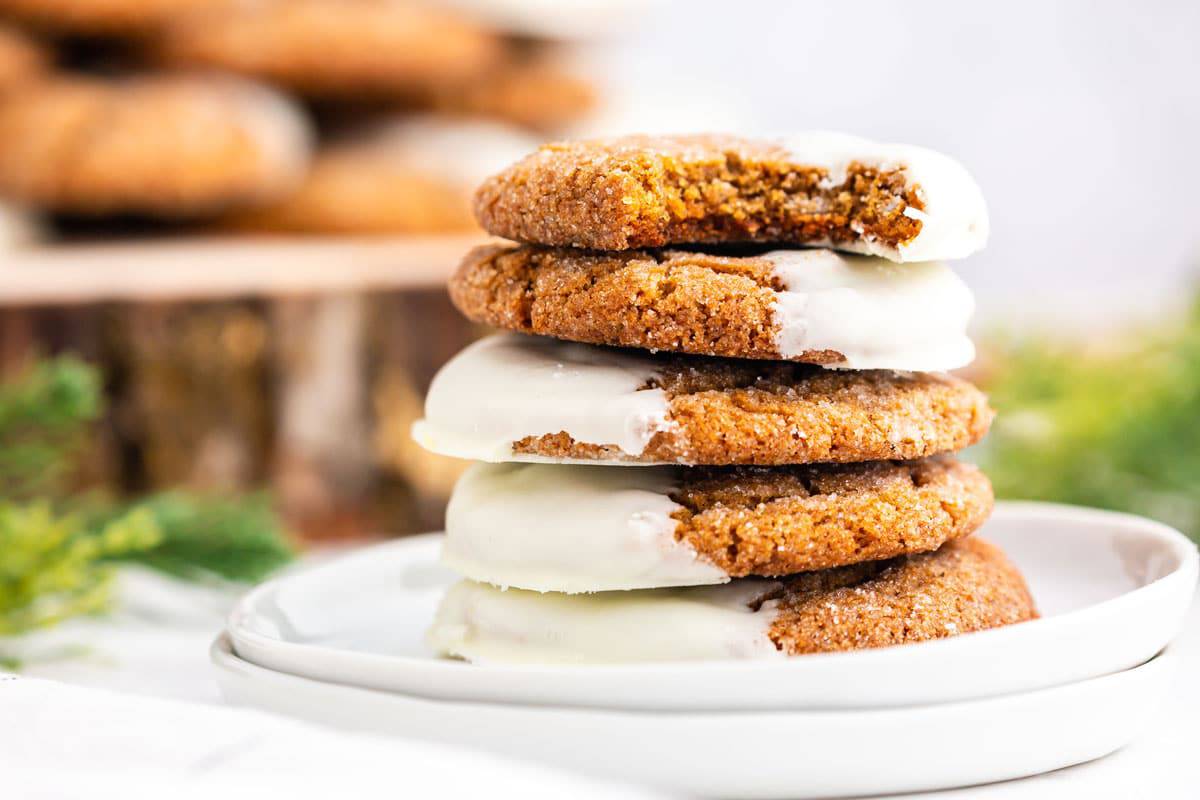 A stack of frosted ginger cookies