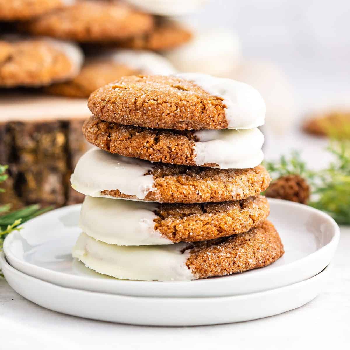 A stack of frosted ginger cookies