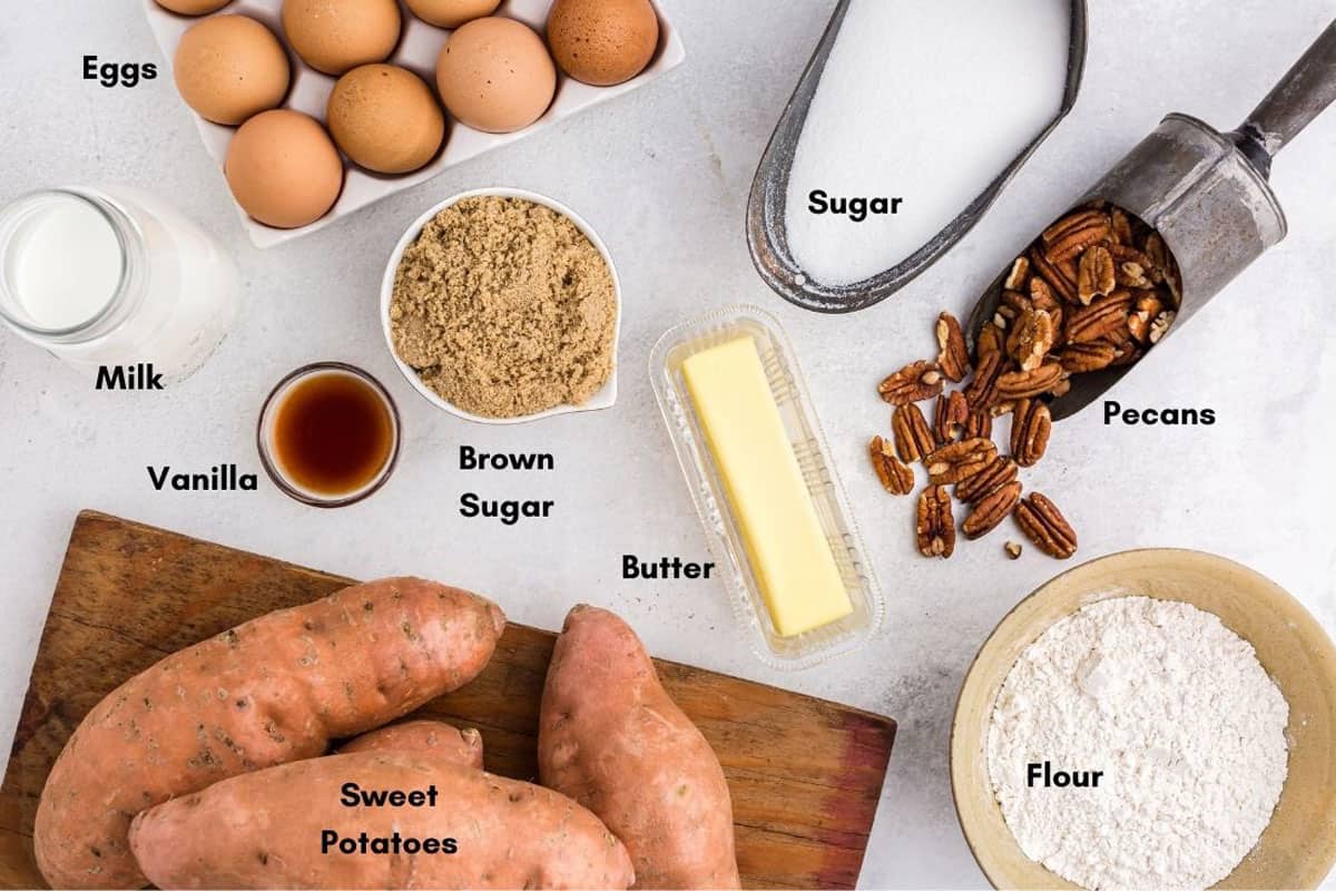 Ingredients for sweet potato souffle Sweet Potatoes on a cutting board and other ingredients
