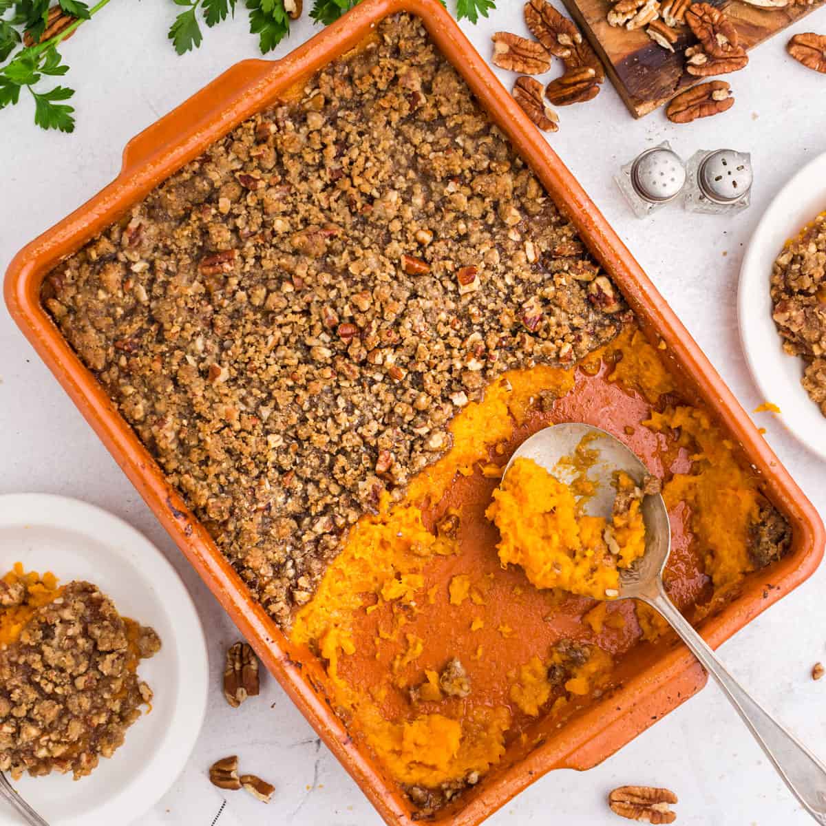 Sweet potato souffle in a casserole dish. A pan of sweet potato souffle