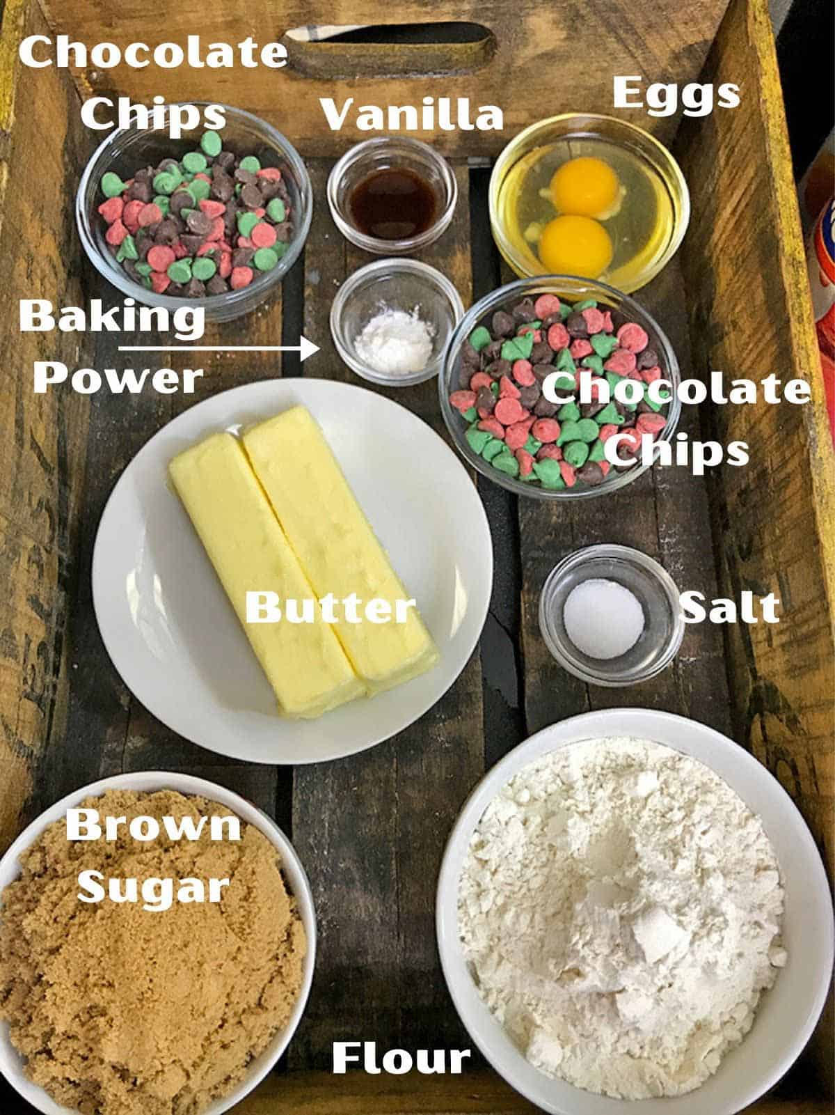 Ingredients for Christmas cookie bars Butter, flour, chocolate chips and other baking ingredients.