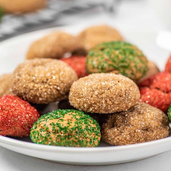 a bunch of spice cookies on a plate