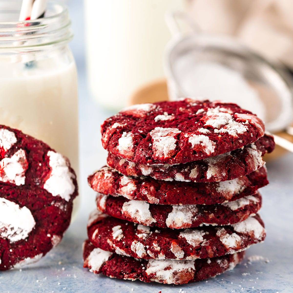Red velvet cookies and milk A stack of red velvet cookies