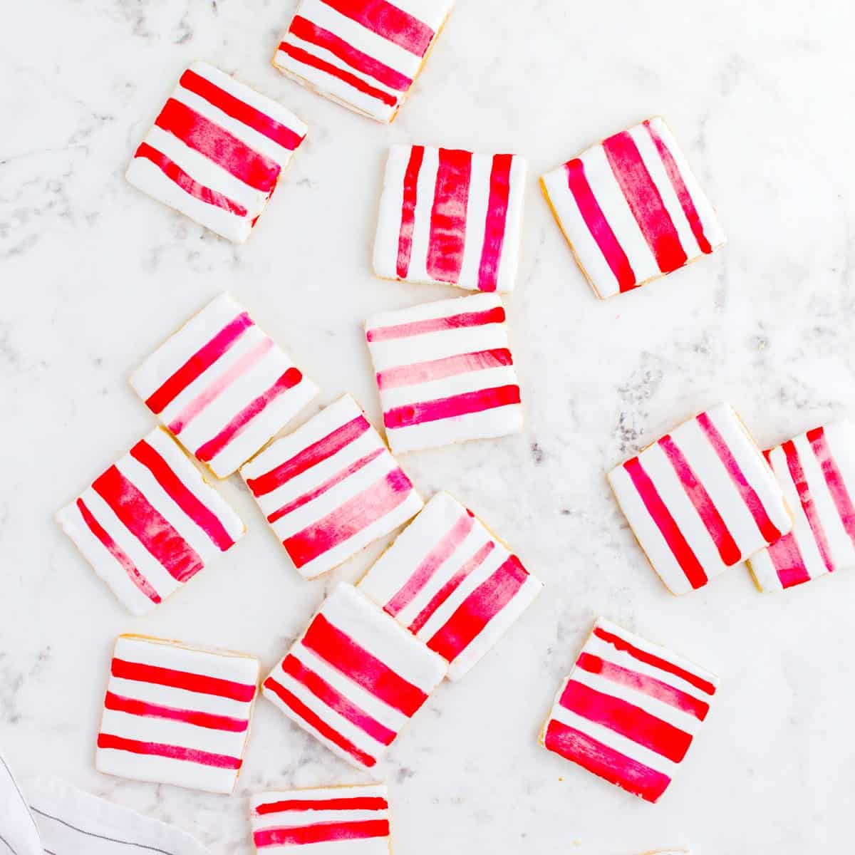 Striped pepperint sugar cookies A bunch of red-striped peppermint sugar cookies