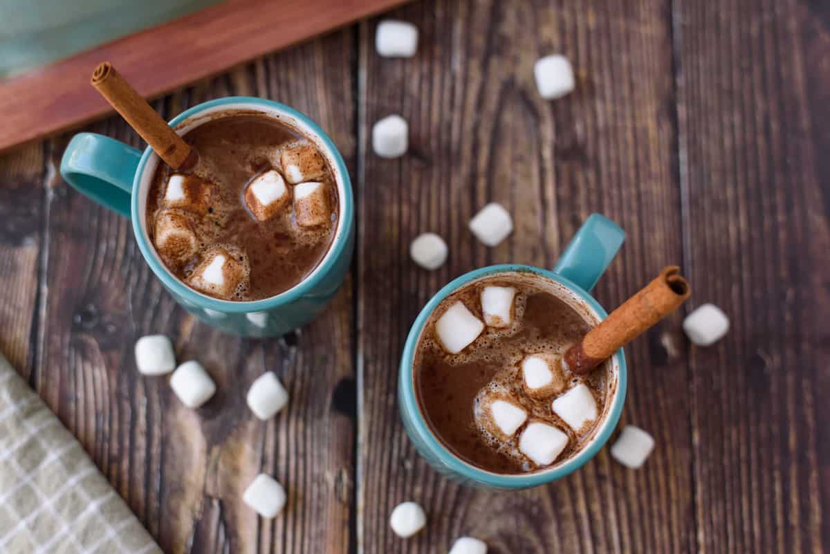 overhead view of two cups of hot chocolate