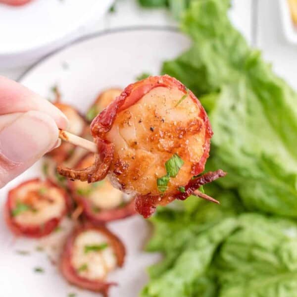 A bunch of bacon wrapped scallops.