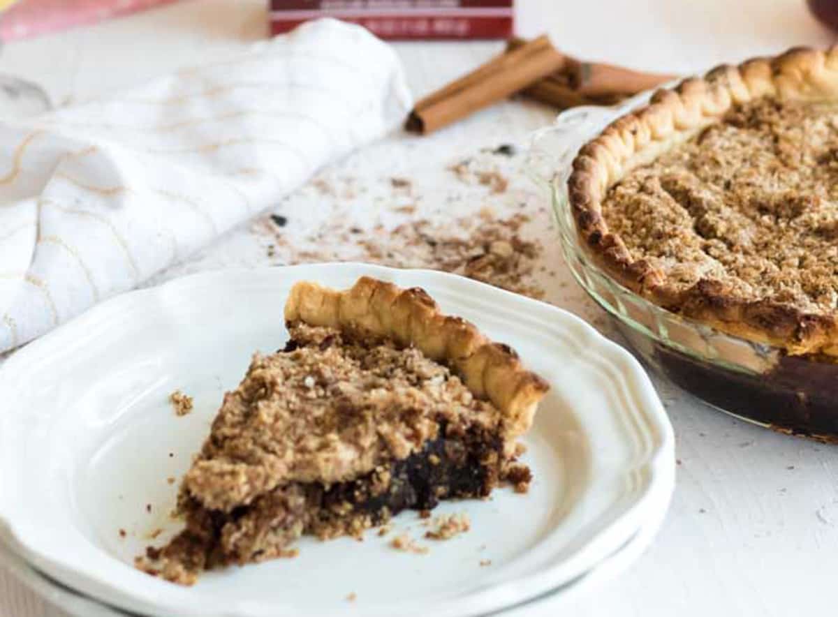 A serving of pie on a plate.