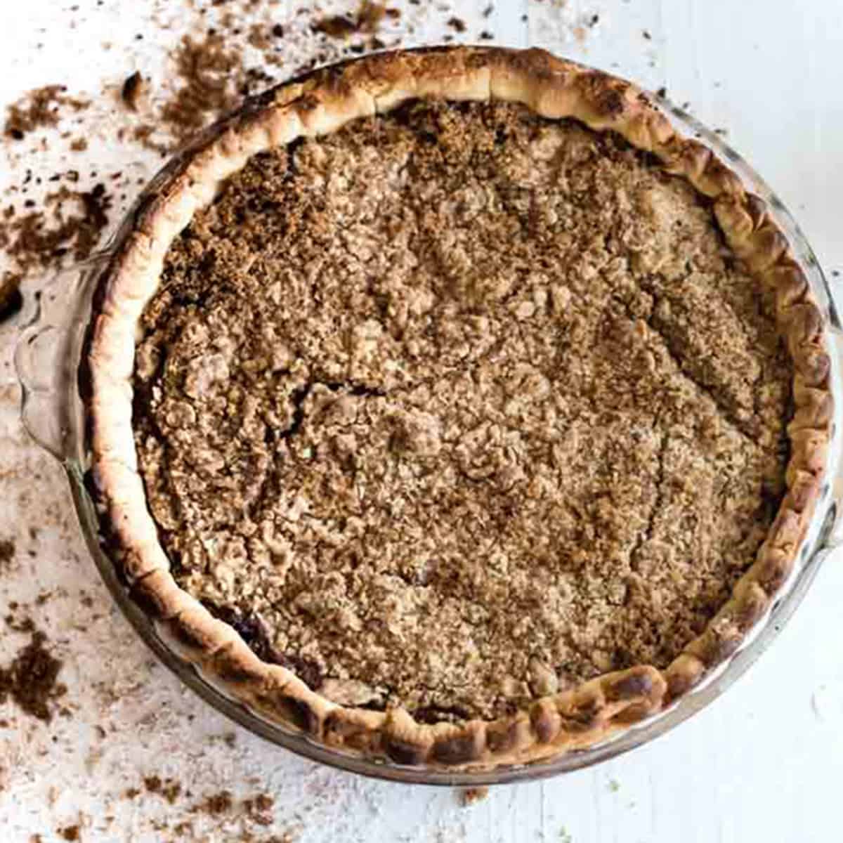 Overhead view of a shoofly pie with a crumb topping.