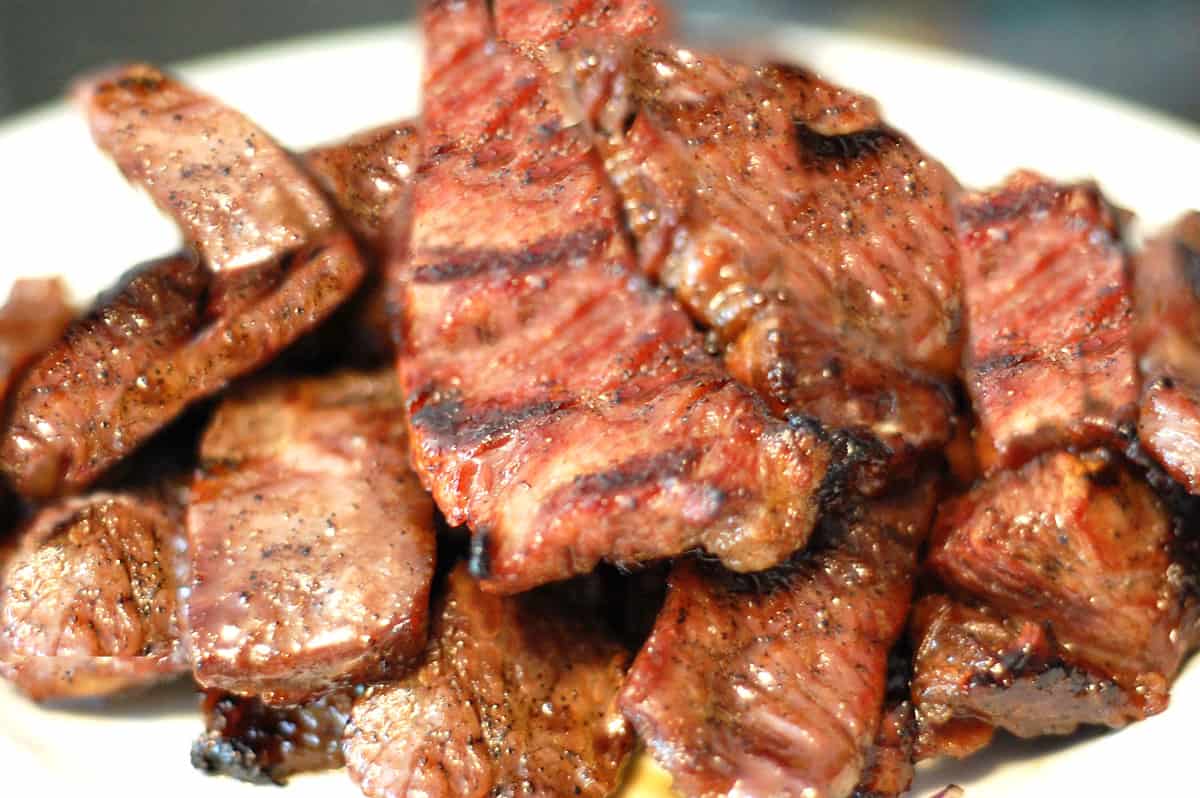 A plate of grilled beef strips.