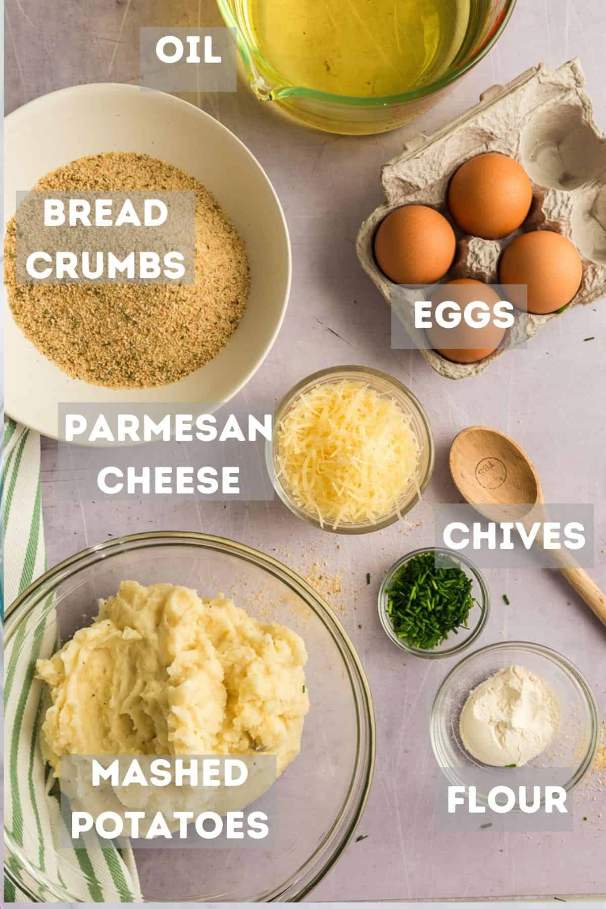 A bowl of mashed potatoes, cheese, and other ingredients for croquettes.