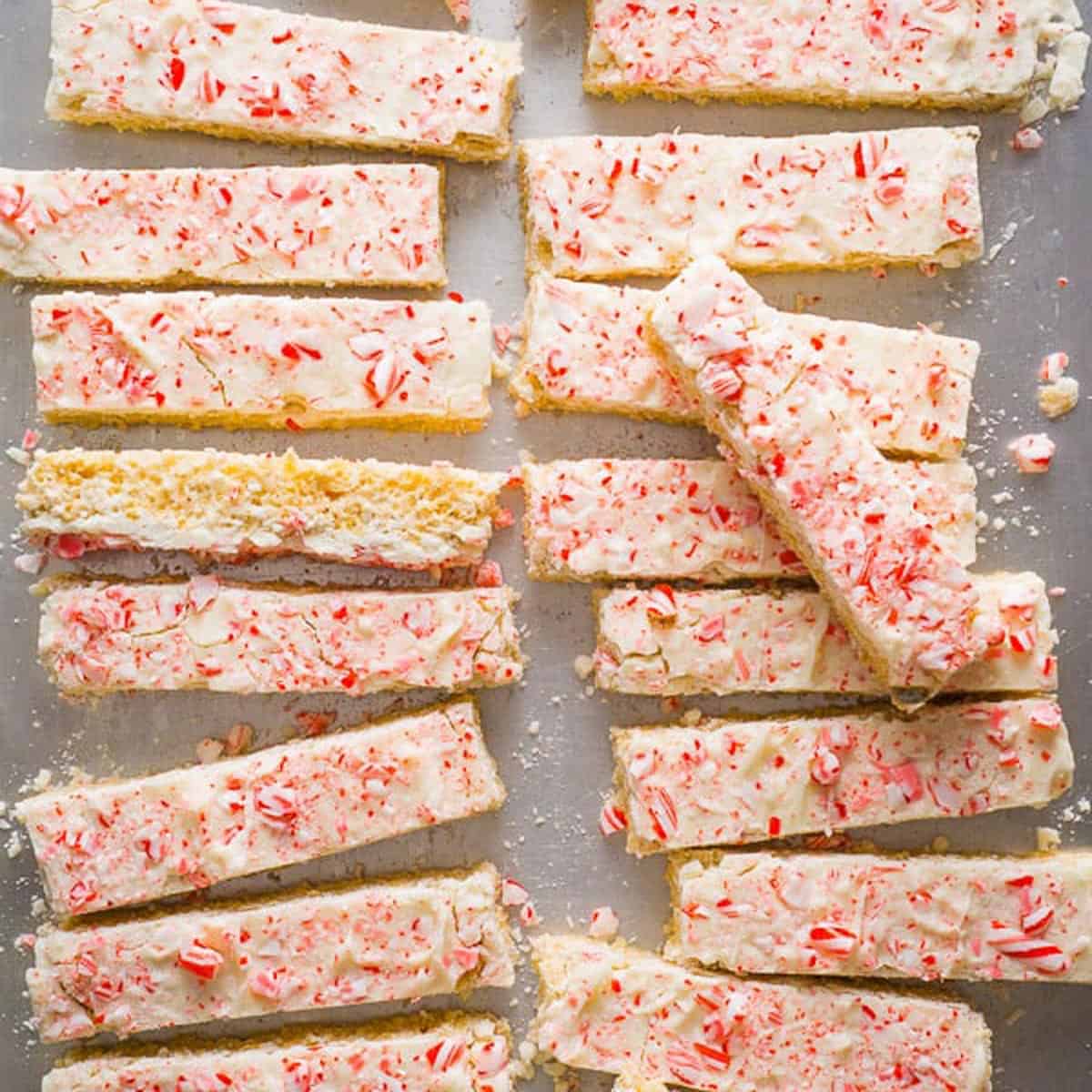 a bunch of rice krispie treats sprinkled with crushed candy canes.