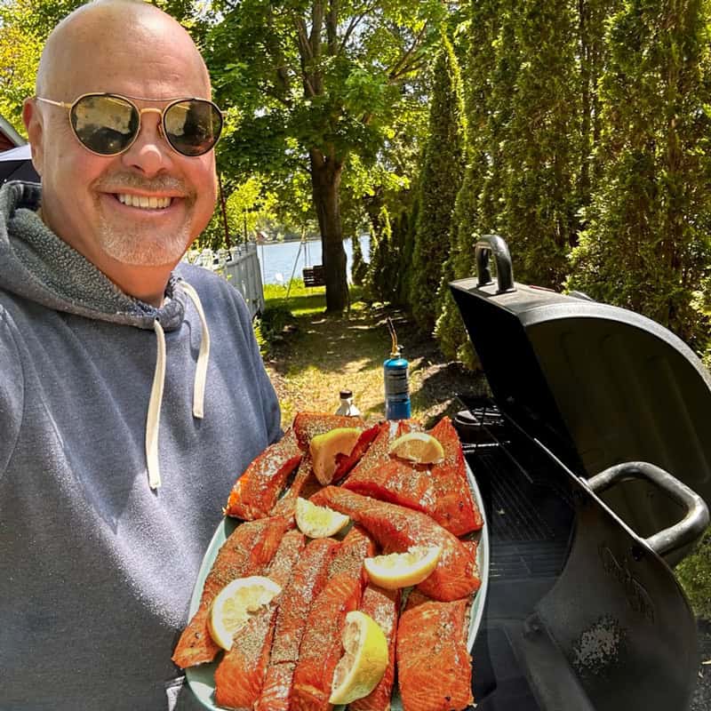 A man with some smoked salmon.