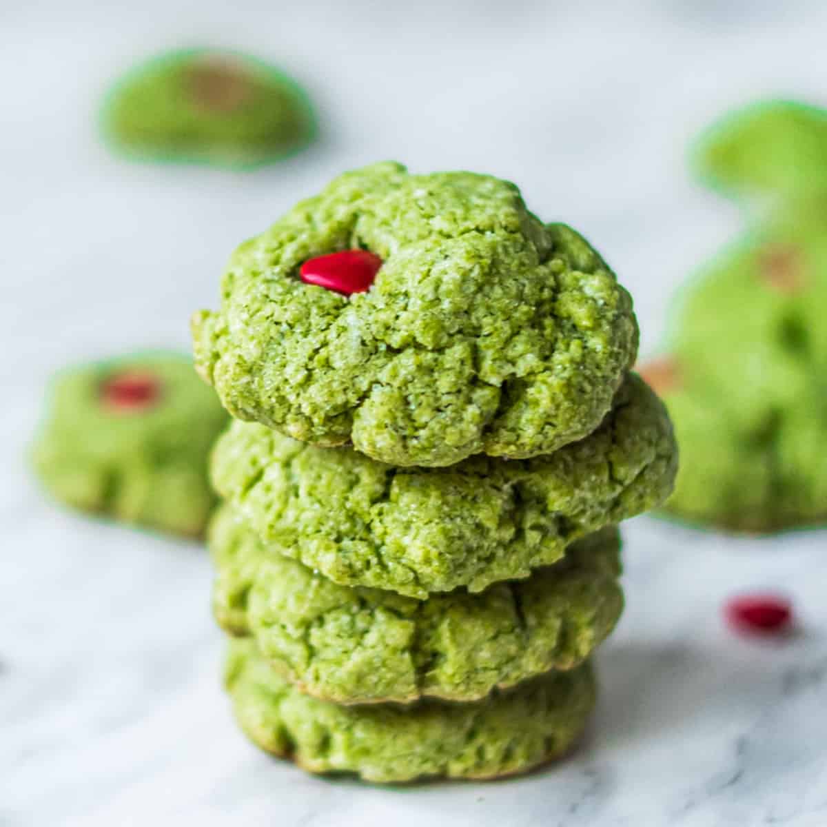 A stack of four green cookies.