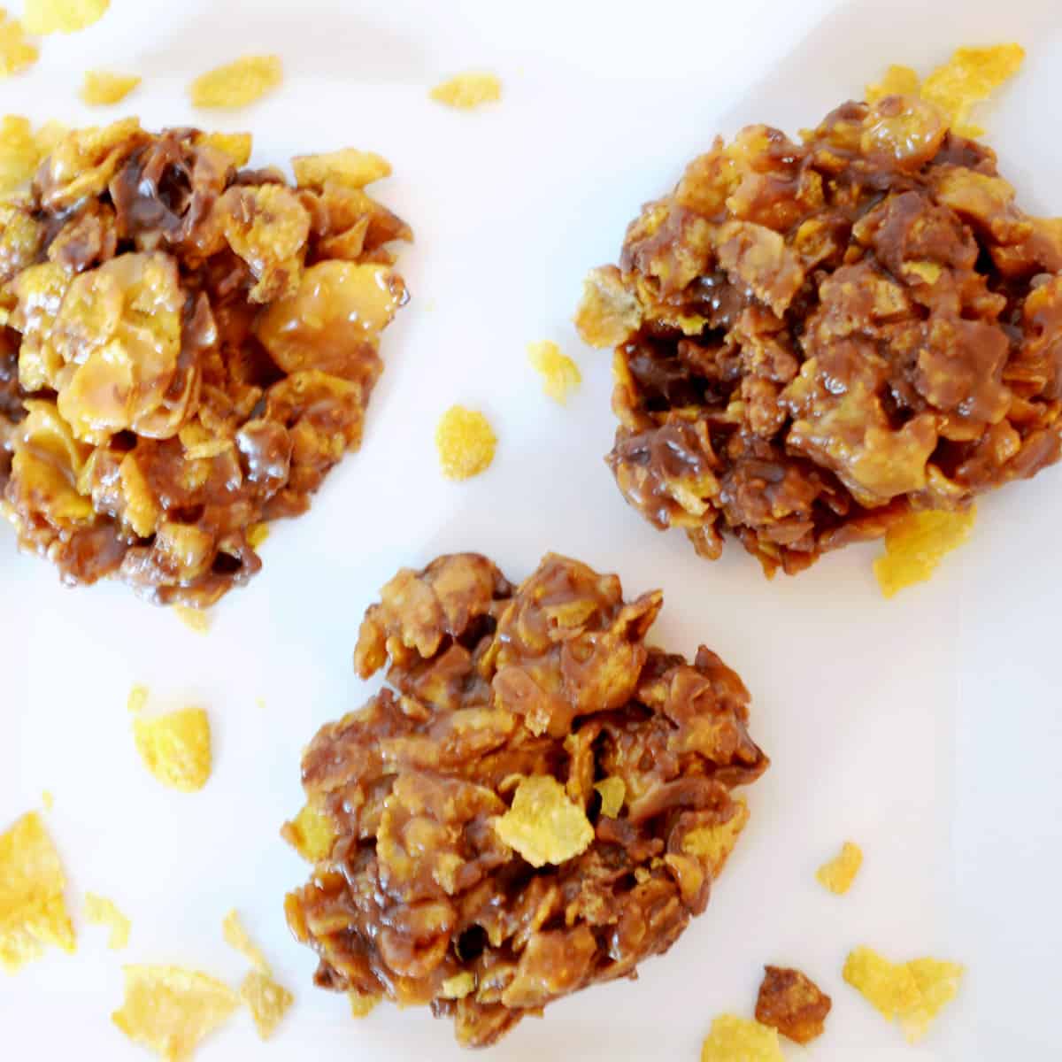 Three no-bake cookies on some parchment paper.