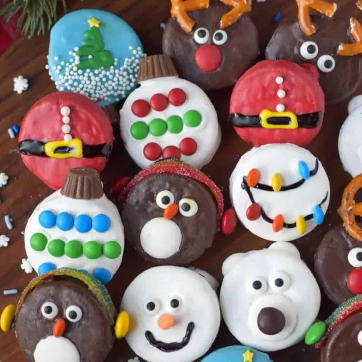 A bunch of oreo-dipped Christmas cookies.