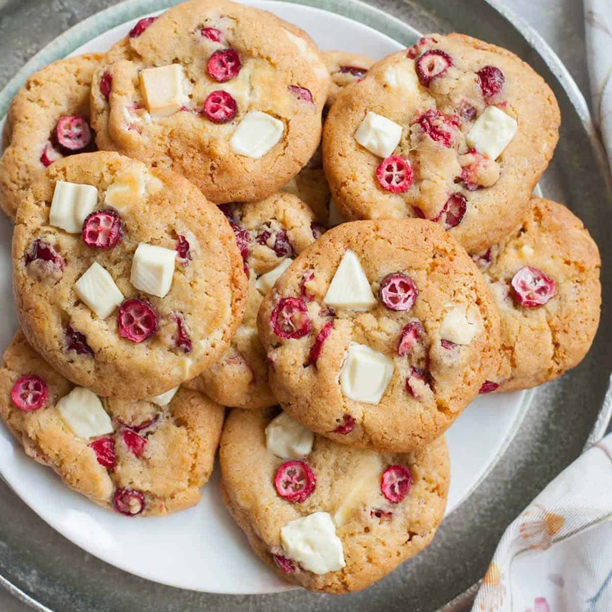A plate of raspberry and white chocolate cookies.