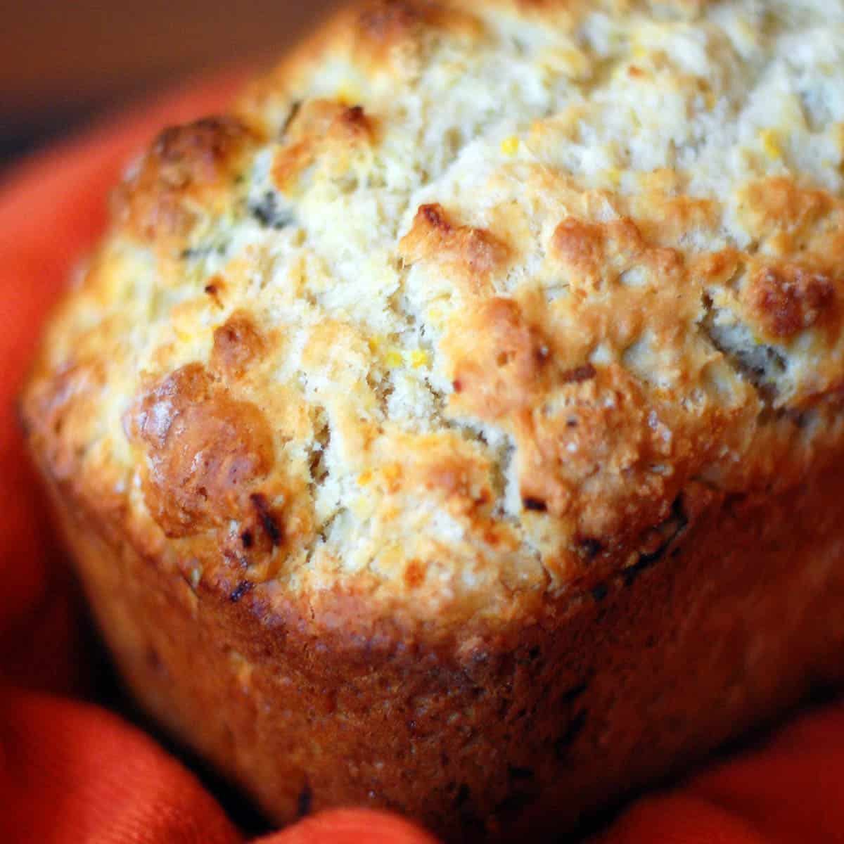 Close up of orange nut bread.